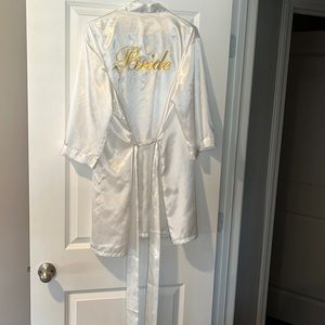 Like new, white and gold lettering “Bride” robe, great condition!